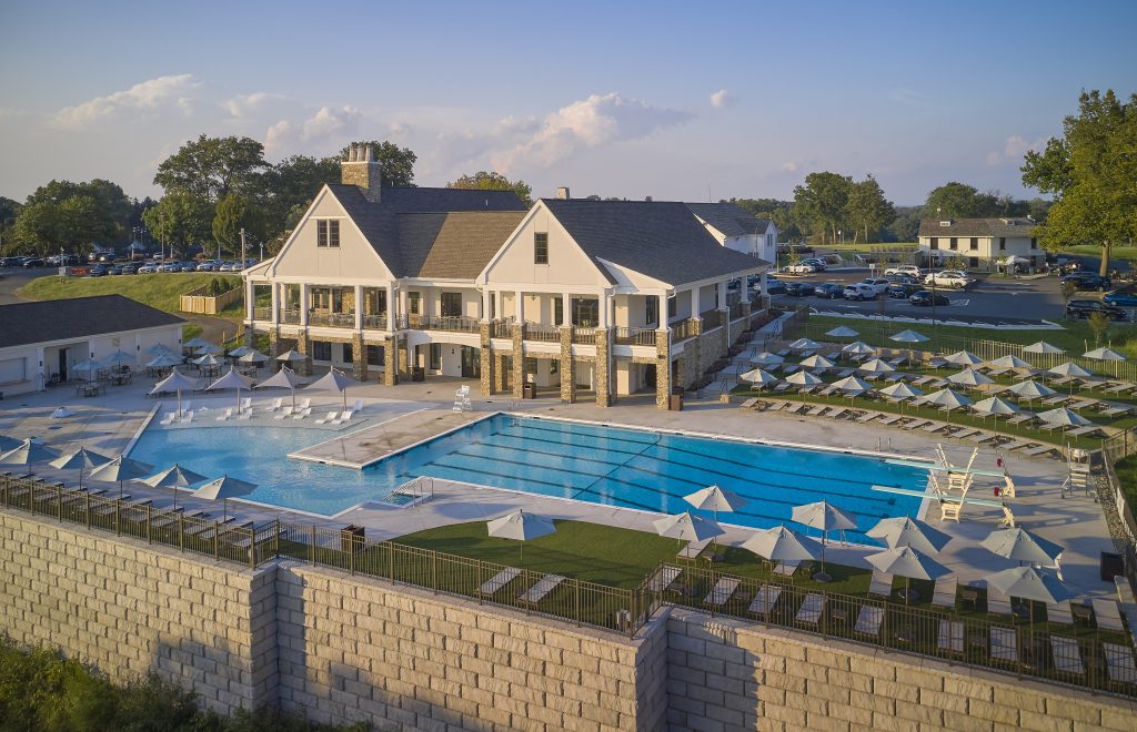 Outdoor amenities include a kitchen and bar, pool-deck café, kiddie pool, zero-entry, resort-style leisure pool and a 25-meter, eight-lane outdoor competition pool.