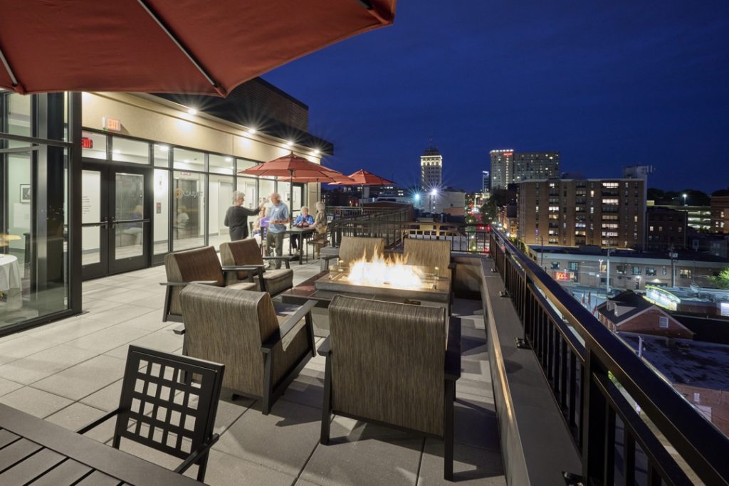 The rooftop terrace provides expansive city views.