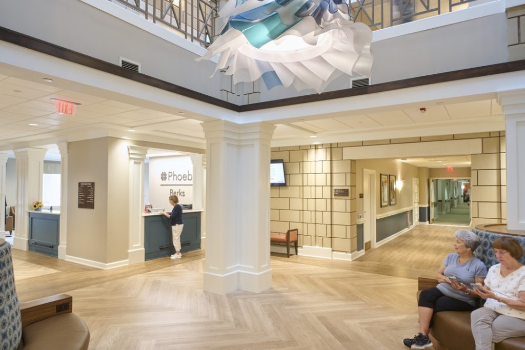 The relocated reception desk is neatly tucked away out of the circulation path and new banquettes with USB chargers soften the space and encourage people to linger.