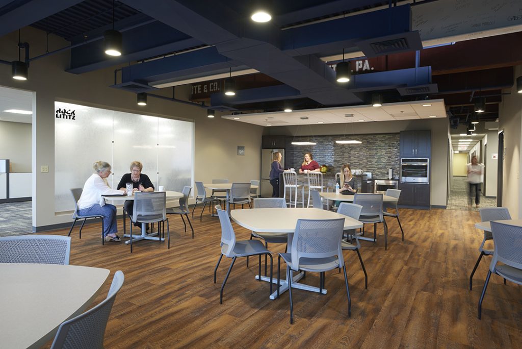 Cafe space for employees promotes a collaborative space among disciplines.